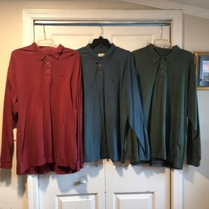 Three men’s long sleeve pull over shirts
